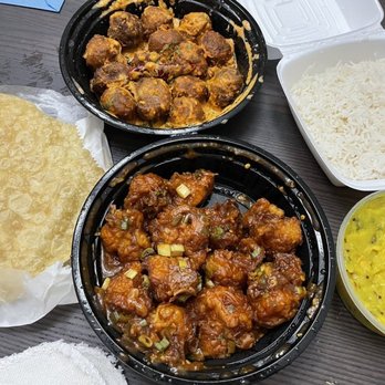 Bawarchi Biryani's - Top center- 555 Veg Balls Bottom center- Manchurian Gobi Left- Bread that goes with the Puri Bhaji Bottom right- Puri Bhaji - Indian Near Me - Brandon, Florida