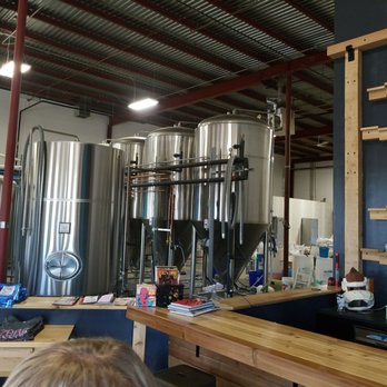 Zero Issue Brewing - a man working in a brewery - Breweries Near Me - Calgary, Alberta Zero Issue Brewing - a man working in a brewery - Breweries Near Me - Calgary, Alberta