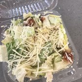 Photo of Razzo's Pizza and Salads - Oakland, CA, United States. Chicken Caesar open box. So good makes me wanna try it on a wrap.