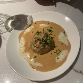 Cafe 44 - Bison meatball with grits - American Near Me - Alexandria, Virginia Cafe 44 - Bison meatball with grits - American Near Me - Alexandria, Virginia