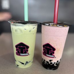 Matcha milk tea with grass jelly and strawberry banana smoothie with tapioca Matcha milk tea with grass jelly and strawberry banana smoothie with tapioca