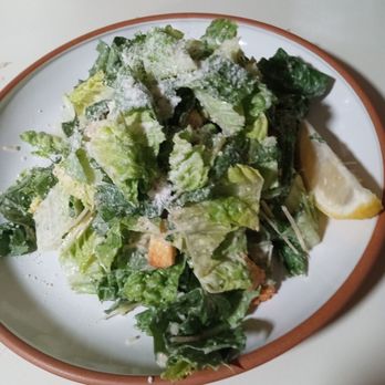 Sopranos Pizza & Pasta - Unpacked half Caesar salad when plated for presentation - Pizza Near Me - Seattle, Washington Sopranos Pizza & Pasta - Unpacked half Caesar salad when plated for presentation - Pizza Near Me - Seattle, Washington