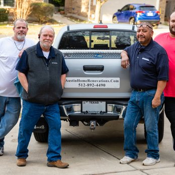 Austin Home Renovations - three men standing in front of a truck - General Contractors Near Me