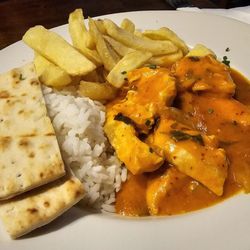 Smyth's Pub - Red Chicken Curry with Chips and Rice.