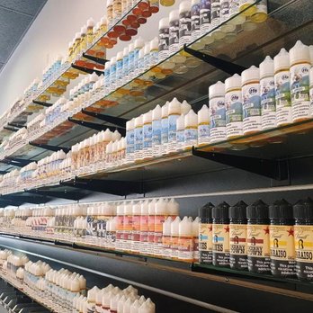 Monster Vape - Product - Ejuice and E-Liquid wall featuring Red Star Juice and premium brands like Juice Head. - Vape Shops Near Me - Corpus Christi, Texas Monster Vape - Product - Ejuice and E-Liquid wall featuring Red Star Juice and premium brands like Juice Head. - Vape Shops Near Me - Corpus Christi, Texas