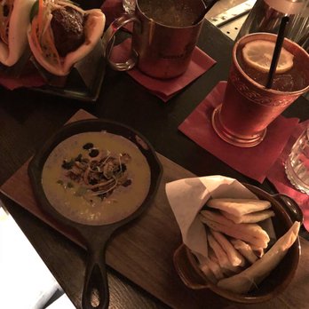 Arbella - Food: Chicken Baos and Black Bean Hummus. Drinks: Nagano Mule and Snow Blossom. - Tapas/Small Plates Near Me - Chicago, Illinois