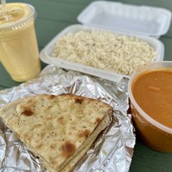Little India Puyallup - Butter chicken (mild) with garlic naan bread and mango lassi drink for dinner! 6/14/25
