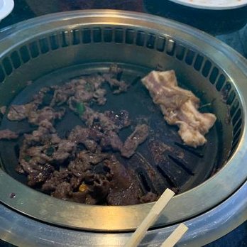 Kpop Bbq and Bar - Cooking beef bulgogi and pork belly. - Korean Near Me - Woodstock, Georgia Kpop Bbq and Bar - Cooking beef bulgogi and pork belly. - Korean Near Me - Woodstock, Georgia