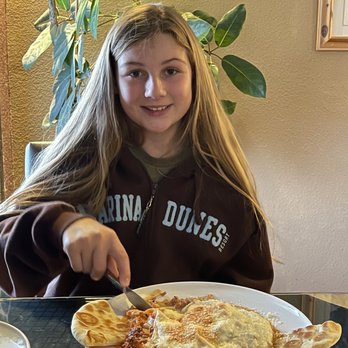 Pangaea Restaurant and Wine Bar - Avalina eating her very flavorful pasta with all kinds of cheese! - Mediterranean Near Me - Temecula, California Pangaea Restaurant and Wine Bar - Avalina eating her very flavorful pasta with all kinds of cheese! - Mediterranean Near Me - Temecula, California