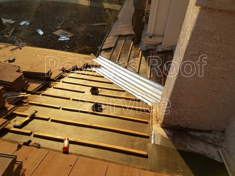 Slide of Powers Roof Service