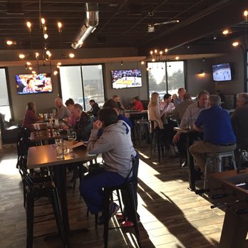 Five Cities Brewing - a large group of people sitting at tables - Breweries Near Me - Bettendorf, Iowa