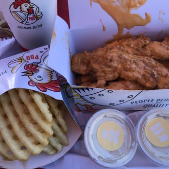 PDQ Jacksonville: Beach & Hodges - Chicken tenders tossed in buffalo bleu sauce. Waffle fries and creamy garlic sauce. - Fast Food Near Me - Jacksonville, Florida