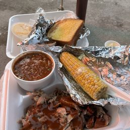 Put Stop BBQ plate, corn on the cobb, and Brunswick stew. Put Stop BBQ plate, corn on the cobb, and Brunswick stew.