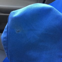 Nelson's Cleaners & Laundry - Hole that was blamed on my elbow. My elbow is about 8inches away from that hole they caused. Maybe my elbow caused that bleach stain.