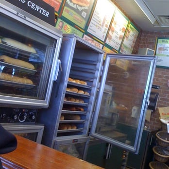 Subway - a man standing in front of a bakery counter - Sandwiches Near Me - Orlando, Florida Subway - a man standing in front of a bakery counter - Sandwiches Near Me - Orlando, Florida