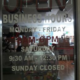 Business hours on door.