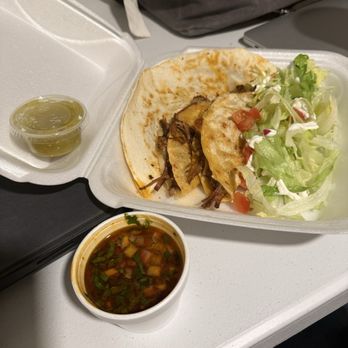 Tacos Mexicanos la Huerta - Two small birria quesadillas with consomé, and a regular chorizo quesadilla with salsa verde. Fantastic. - Food Trucks Near Me Tacos Mexicanos la Huerta - Two small birria quesadillas with consomé, and a regular chorizo quesadilla with salsa verde. Fantastic. - Food Trucks Near Me