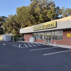 M. Kerrigan Paving and Construction - Dollar general store oil spot saw cut and patched with hot asphalt sealcoated and stripes