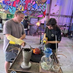 Panama City Hot Glass Studio of M.G&S - Felicia made sure to fill all the gaps and stayed running while Brandon guided us through all of the designing.