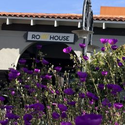 View of Row House sign above its 2nd floor entrance from the beautiful Campbell Pruneyard courtyard.