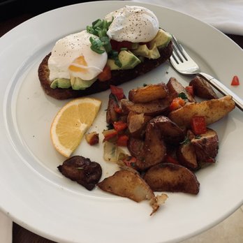 The Wave Kitchen & Bar - Avocado toast w/ poached eggs & home fries - Bars Near Me - Vero Beach, Florida