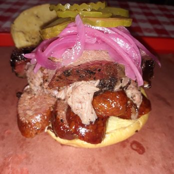 Teddy’s Barbecue - El Jefe de Jefes: Brisket, Pulled Pork,& Smoked Sausage piled high on an incredible sandwich. - Barbeque Near Me - Weslaco, Texas Teddy’s Barbecue - El Jefe de Jefes: Brisket, Pulled Pork,& Smoked Sausage piled high on an incredible sandwich. - Barbeque Near Me - Weslaco, Texas