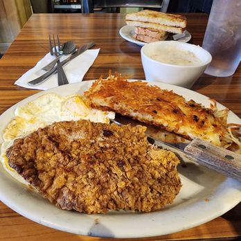 The Getaway Cafe - Chicken fried steak with sausage gravy, eggs, hashbrowns, and sourdough toast.. YUM! - American Near Me - Meyers, California The Getaway Cafe - Chicken fried steak with sausage gravy, eggs, hashbrowns, and sourdough toast.. YUM! - American Near Me - Meyers, California