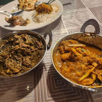 Punjabi Bites - Partially eaten Chicken Korma and Goat Saag - Indian Near Me - Rockville Centre, New York Punjabi Bites - Partially eaten Chicken Korma and Goat Saag - Indian Near Me - Rockville Centre, New York