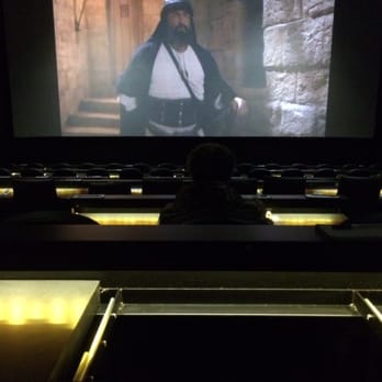 Flix Brewhouse Carmel - The view from my seat. They play movie clips from similar movies before previews start! - Cinema Near Me - Carmel, Indiana