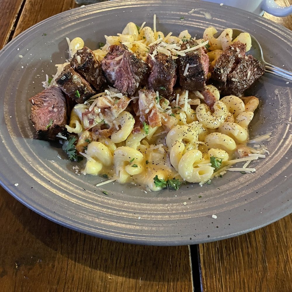 Mac n cheese with bacon with the steak add on option Mac n cheese with bacon with the steak add on option