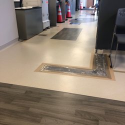 Plano VA Outpatient Clinic - Removed walls.... cheap tape down with no warning for people using walkers