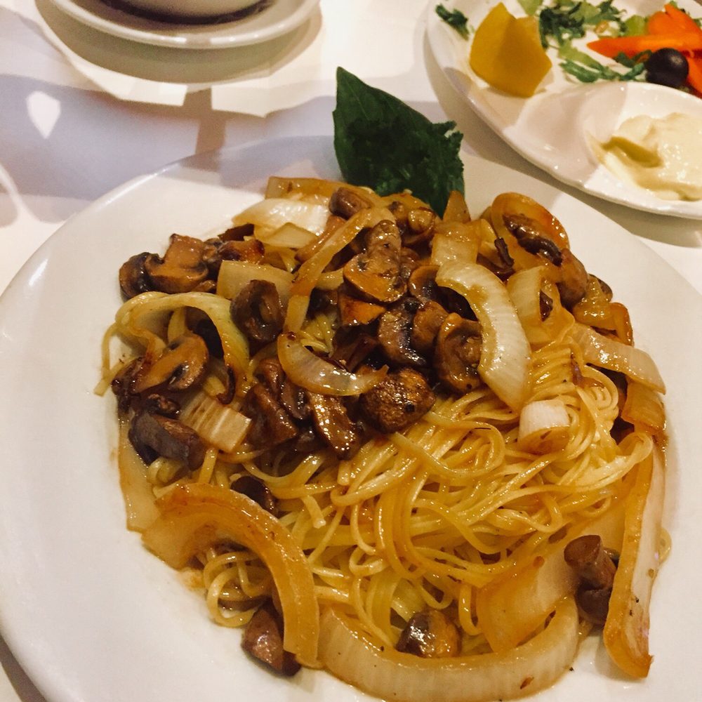 Assaggio Bistro - Vegetarian pasta. Well seasoned with sweet onions and mushrooms - Italian Near Me - Honolulu, Hawaii