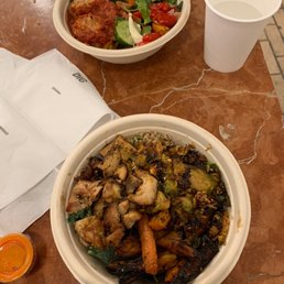 two bowls of food on a table