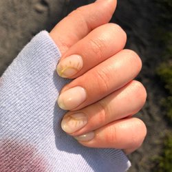 Opaque/nude gel manicure with sunny details