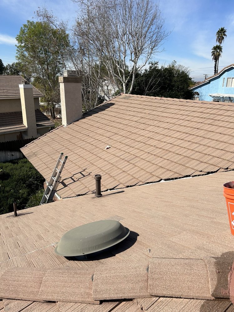 Slide of Manna Roofing Company