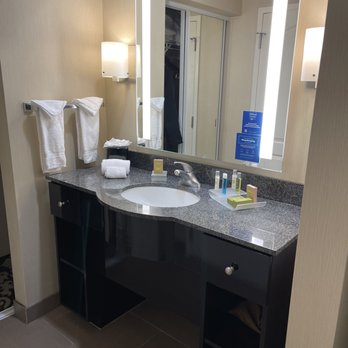 Homewood Suites by Hilton Oxnard/Camarillo - Vanity area featuring Crabtree and Evelyn products. There is a large sliding closet just off to the side with 2 full length mirrors - Hotels Near Me - Oxnard, California Homewood Suites by Hilton Oxnard/Camarillo - Vanity area featuring Crabtree and Evelyn products. There is a large sliding closet just off to the side with 2 full length mirrors - Hotels Near Me - Oxnard, California