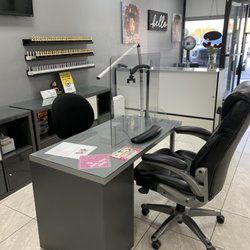 Style Studio - For the safety of our clients, Plexiglass shield is between client and nail tech.