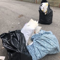 Two Sons Storage - Pillows had feces and urine, trash bags filled with moldy wicker baskets, destroyed boxes and etc household belongings