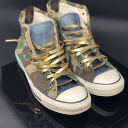 Custom Converse Chucks! Canvas camo, denim and authentic Louis Vuitton paneling with metallic gold leather laces detail.