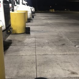 an empty parking lot at night