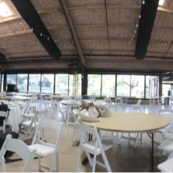 Pera - Panorama of the large, air conditioned, enclosed pavilion during setup for a wedding that will include 2 live bands
