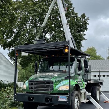Lazer Scapes - a truck with a crane on it - Tree Services Near Me - Newington, Connecticut Lazer Scapes - a truck with a crane on it - Tree Services Near Me - Newington, Connecticut