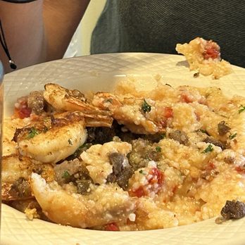 Manuel's Bread Cafe - My wife enjoyed the grits with shrimp. - French Near Me - North Augusta, South Carolina