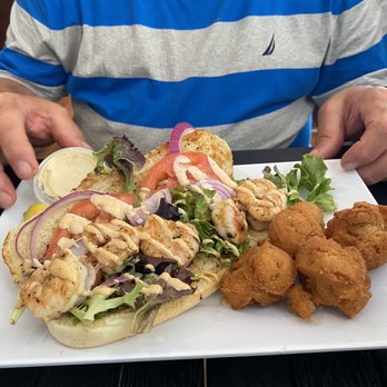 Bubba Gumbo's - Shrimp Po Boy and the star of the show-hush puppies. - Seafood Near Me - Tybee Island, Georgia Bubba Gumbo's - Shrimp Po Boy and the star of the show-hush puppies. - Seafood Near Me - Tybee Island, Georgia