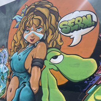 The Mural Mile - One of many works on the flood wall - Public Art Near Me - St. Louis, Missouri