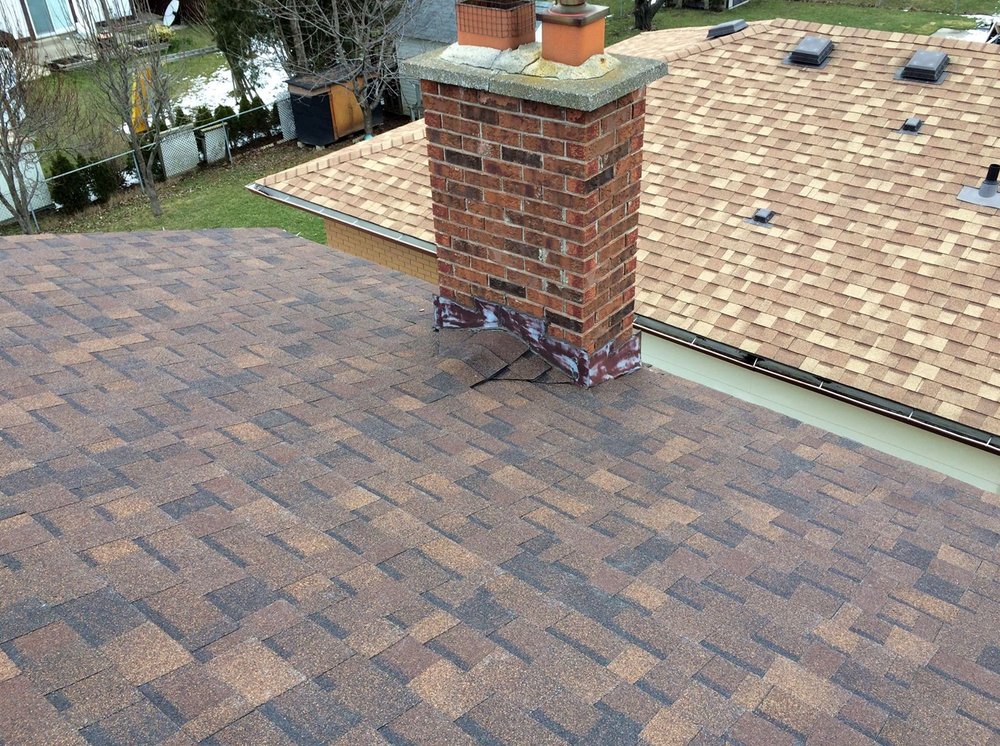 Slide of Park Plaza Roofing