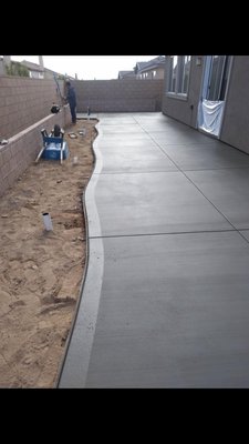 Walkway Remodel - This walkway was too small and outdated, our client wanted something wide enough for the family to easily spend time on, with room for a garden.