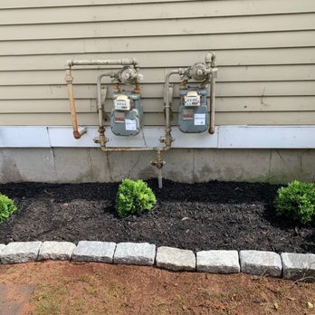 LKV Landscaping - a water meter and a fire hydrant - Landscaping Near Me LKV Landscaping - a water meter and a fire hydrant - Landscaping Near Me