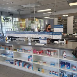 ABC Pharmacy - Pharmacist Lucy busy at work