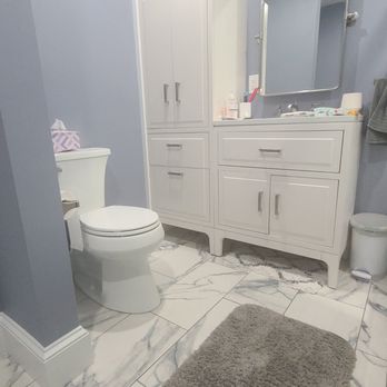 Valle Builders - Vanity, linen closet, and toilet - General Contractors Near Me